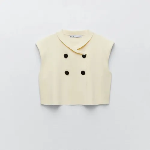KNIT TOP WITH SHOULDER PADS