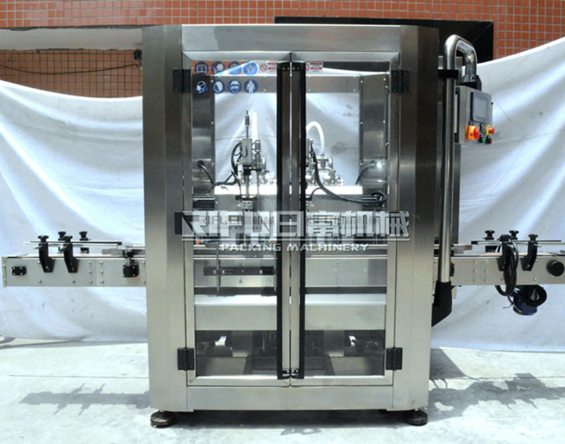 Automatic movable two heads filling machine