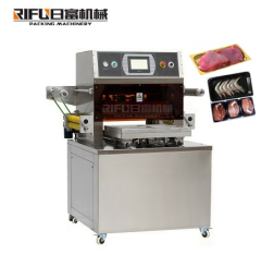 Automatic thermoforming vacuum skin packing machine