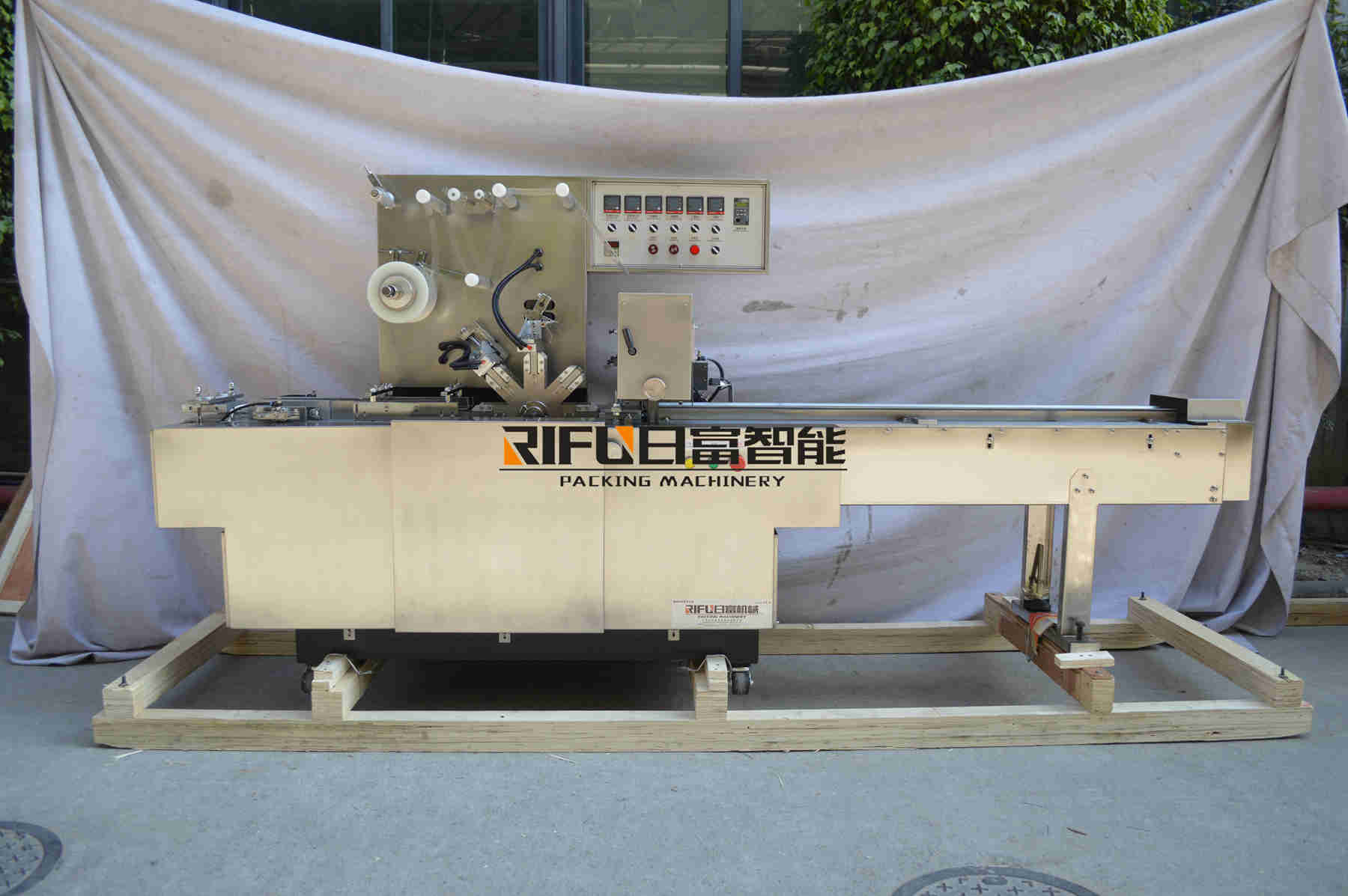 Film wrapping machine for handmade soap