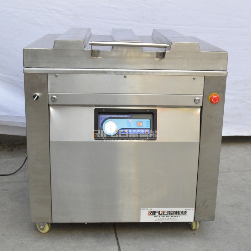 Single chamber vacuum packing machine