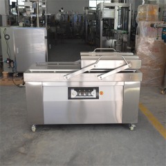 Double chamber vacuum packing machine