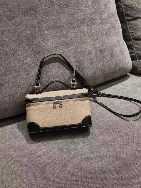 Lunch box Baotou layer cowhide bag 2023 new gigi with a simple fashion hand-held cross-body makeup handbag