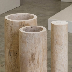 Travertine dining table with Three column-like legs
