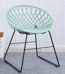 colorful sitting plastic chair with net holding