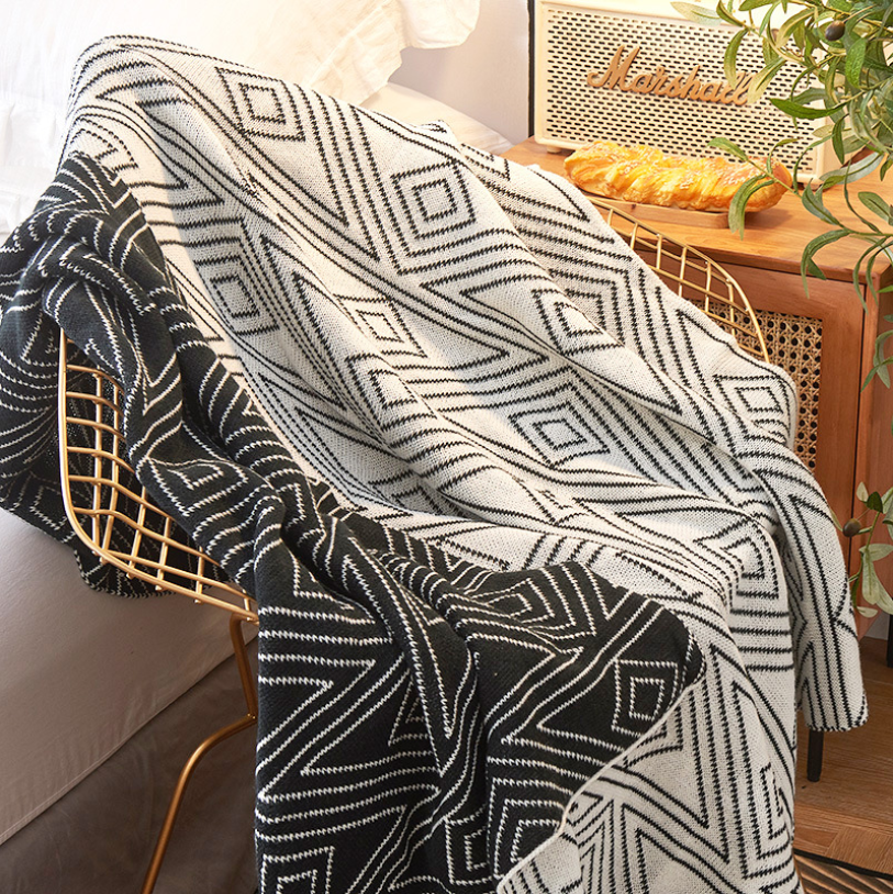 Double side knitted jacquard blanket