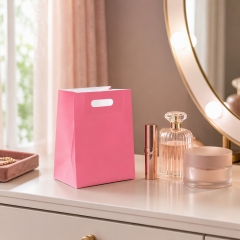 Custom Luxury Matte Kraft Paper Cosmetic Bags with Ribbon Handles for Perfume Skincare Gift Packaging
