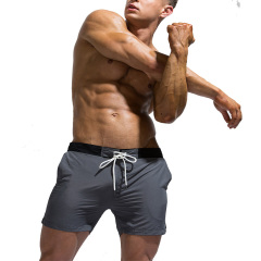 New casual solid color lace-up beach swimming trunks for men