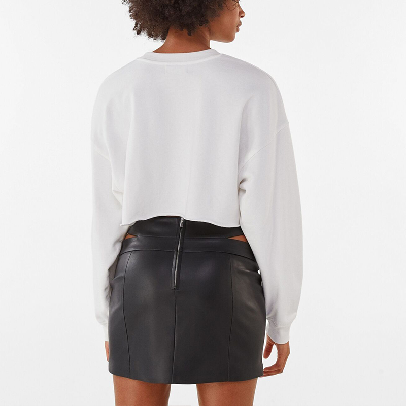 Hollow design faux leather mini skirt