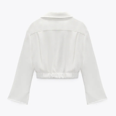 Short shirt with pleated decoration