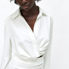 Short shirt with pleated decoration