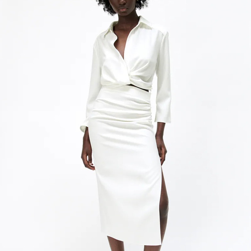 Short shirt with pleated decoration