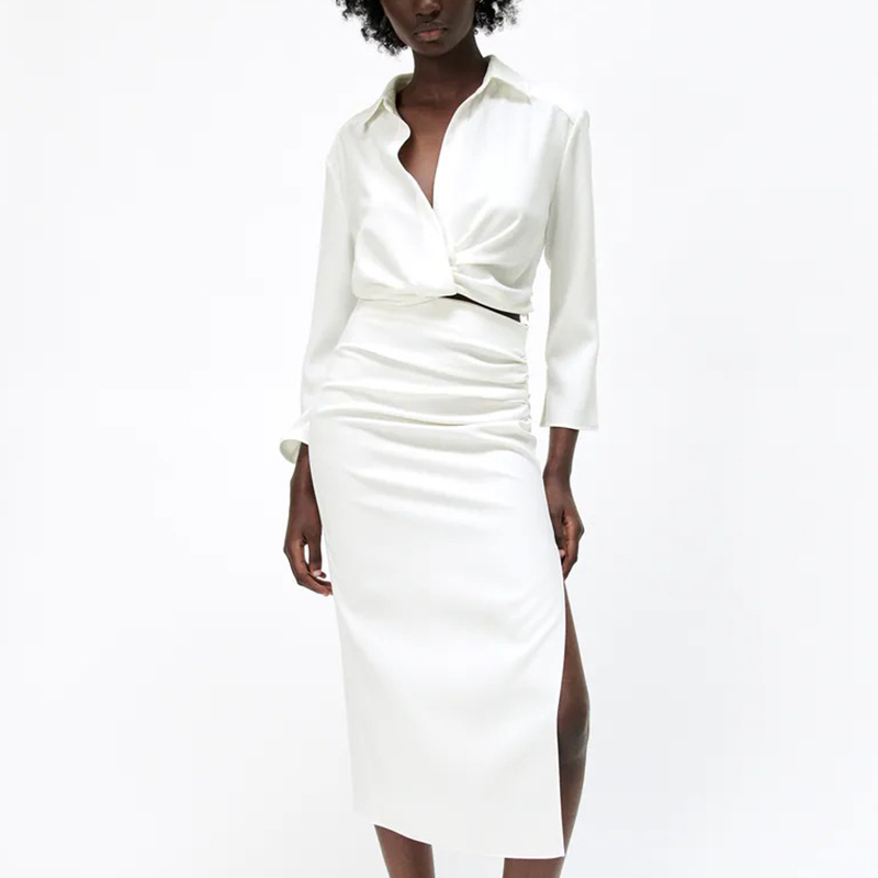 Short shirt with pleated decoration