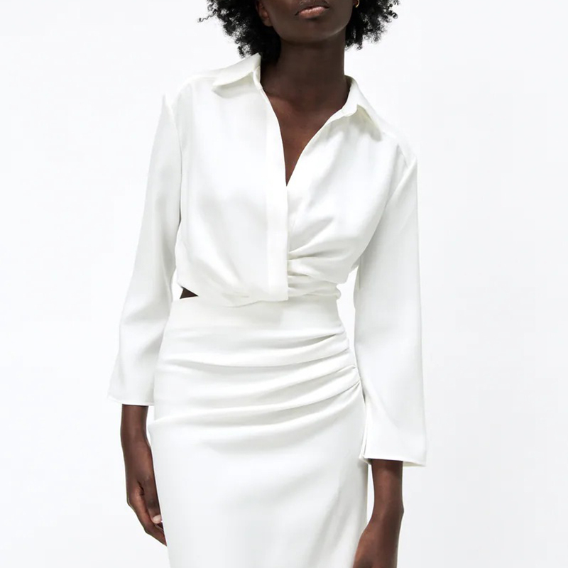 Short shirt with pleated decoration