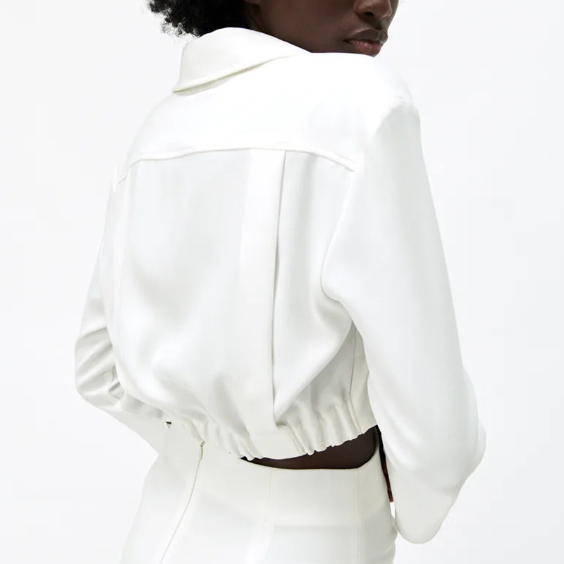 Short shirt with pleated decoration