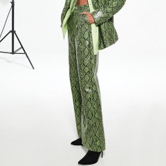 Green snake print wide leg trousers