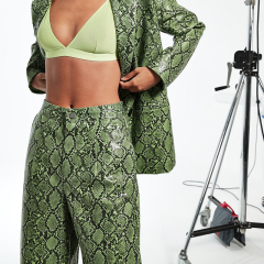 Green snake print wide leg trousers
