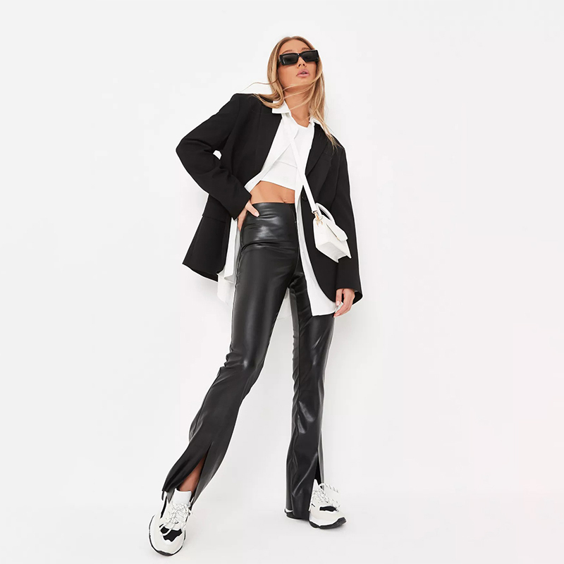 cream faux leather split hem flared trousers