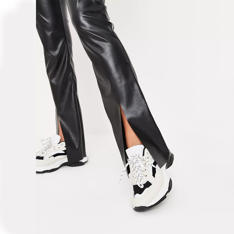 cream faux leather split hem flared trousers