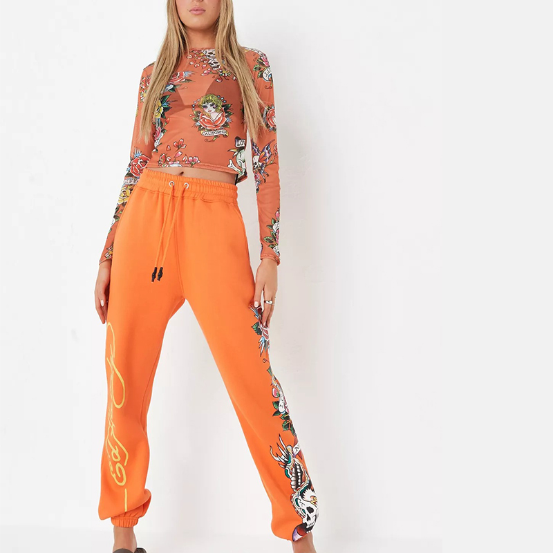 x missguided orange graphic oversized joggers