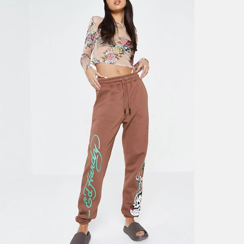 x missguided orange graphic oversized joggers
