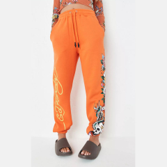 x missguided orange graphic oversized joggers