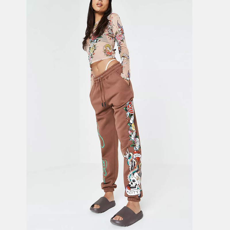 x missguided orange graphic oversized joggers