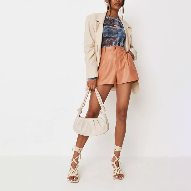 peach faux leather button front shorts