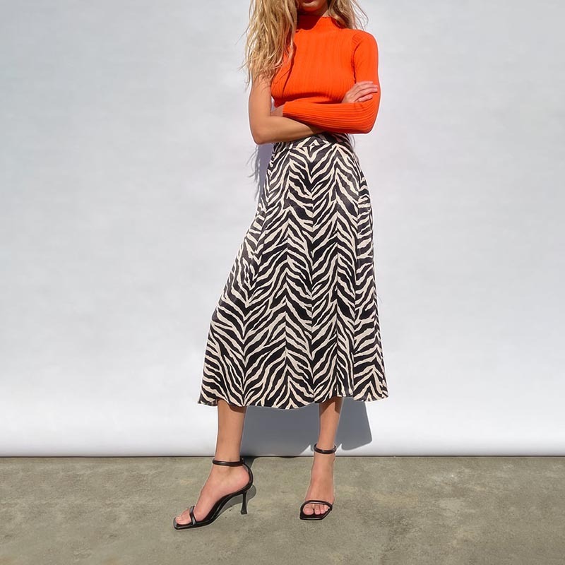 draped animal print dress