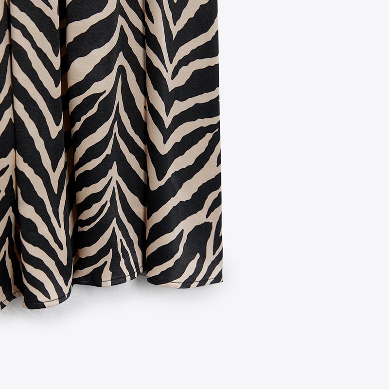 draped animal print dress