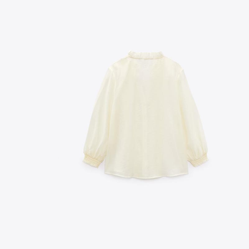 layered embellished translucent shirt