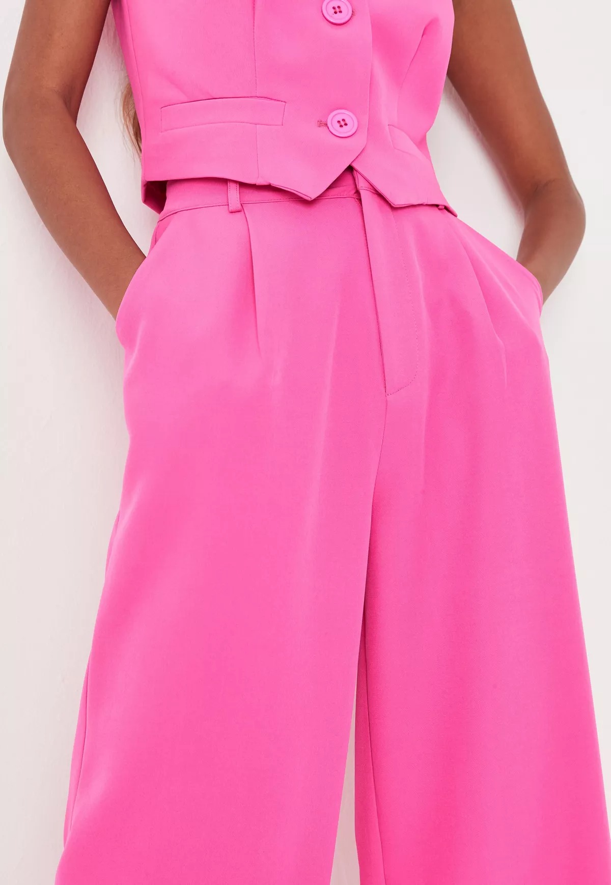 neon pink tailored wide leg trousers