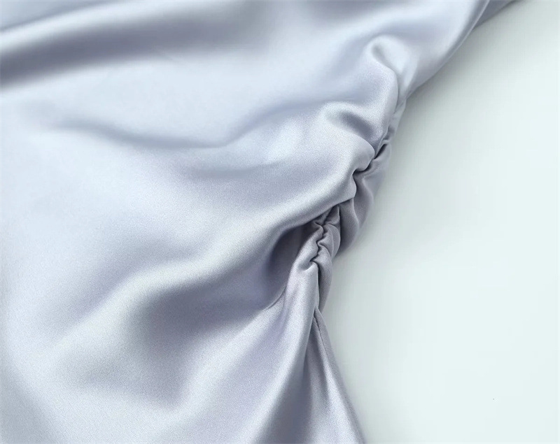 Mid-length dress with halter straps