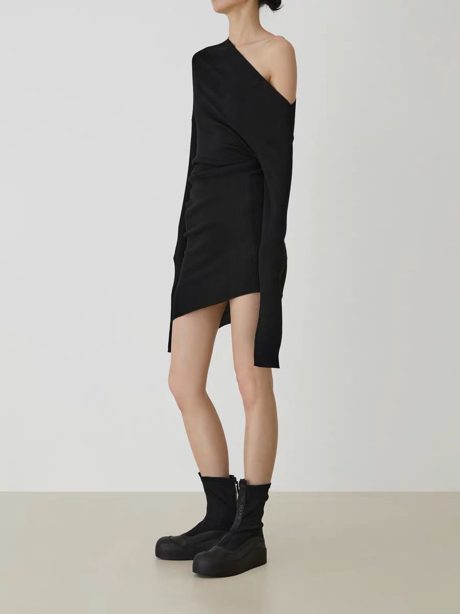 The new Merlot is paired with a wool knit dress