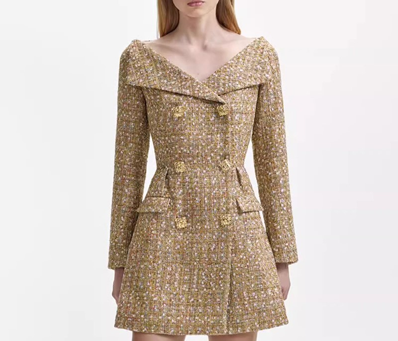 Gold waisted long sleeved dress