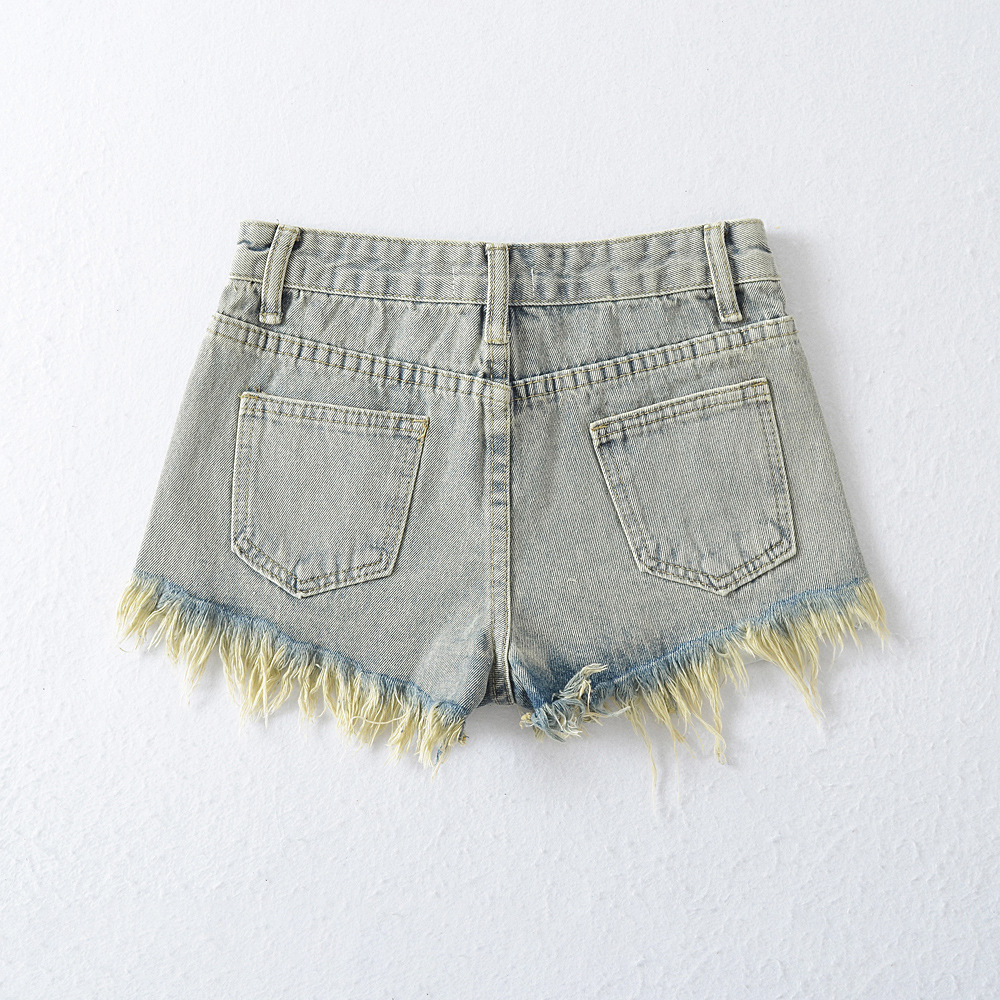 Women's burred and perforated denim shorts