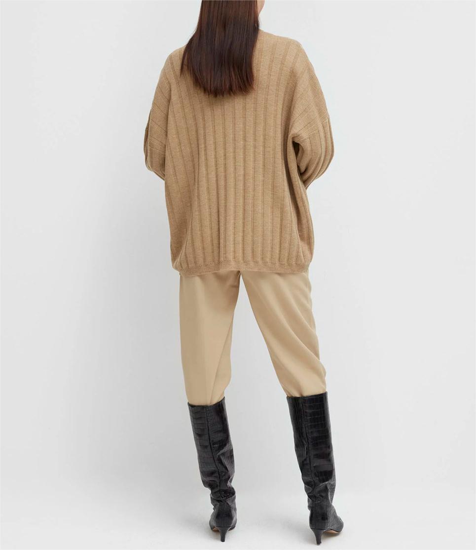 Long sleeved knitted sweater pullover top for women