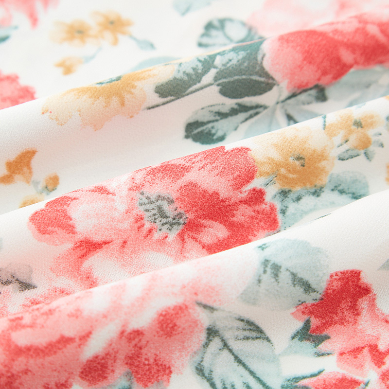 Bright floral print halterneck dress