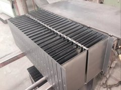 Fin folding machine for corrugated tank