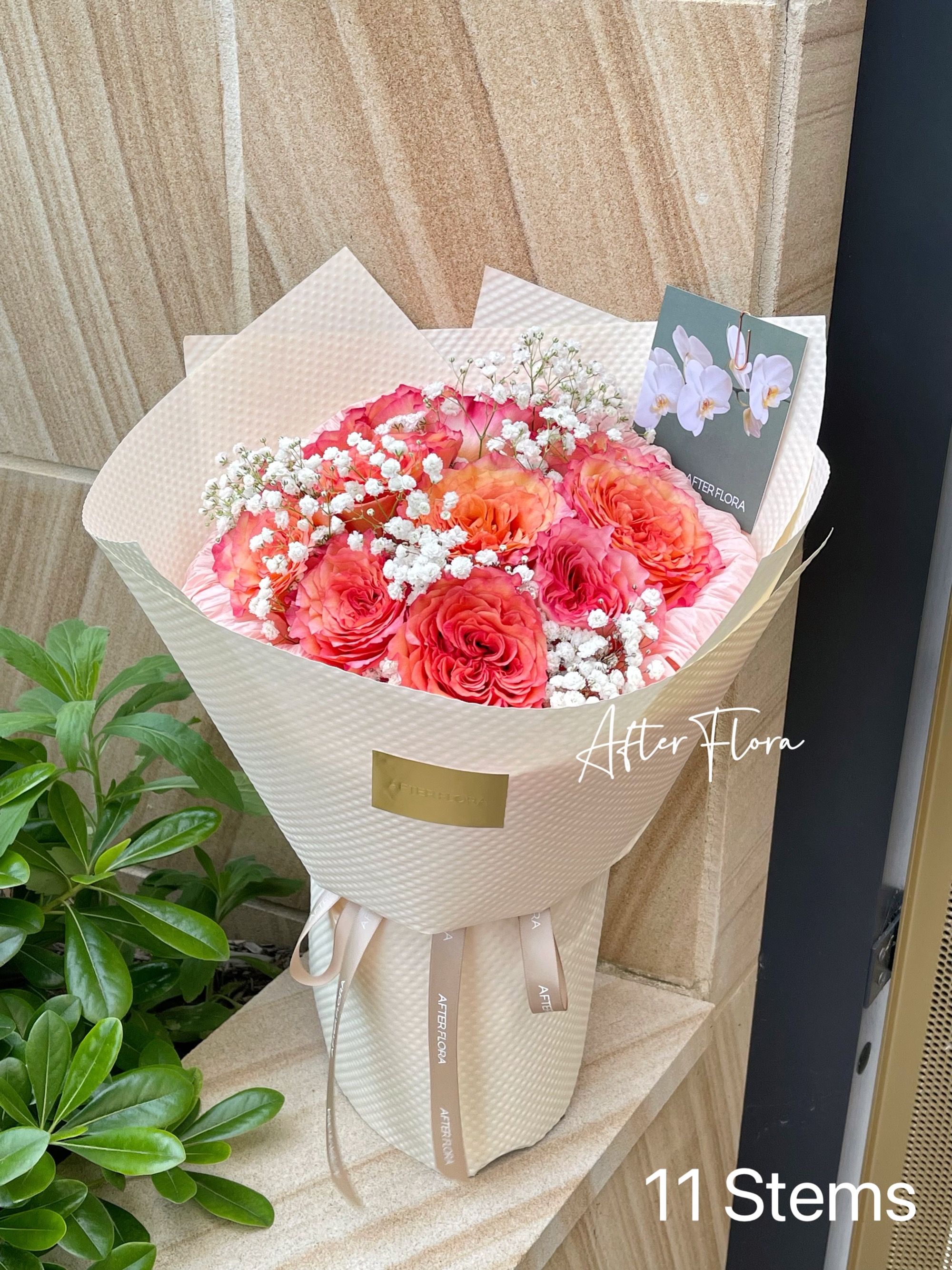 Orange roses+baby's breath