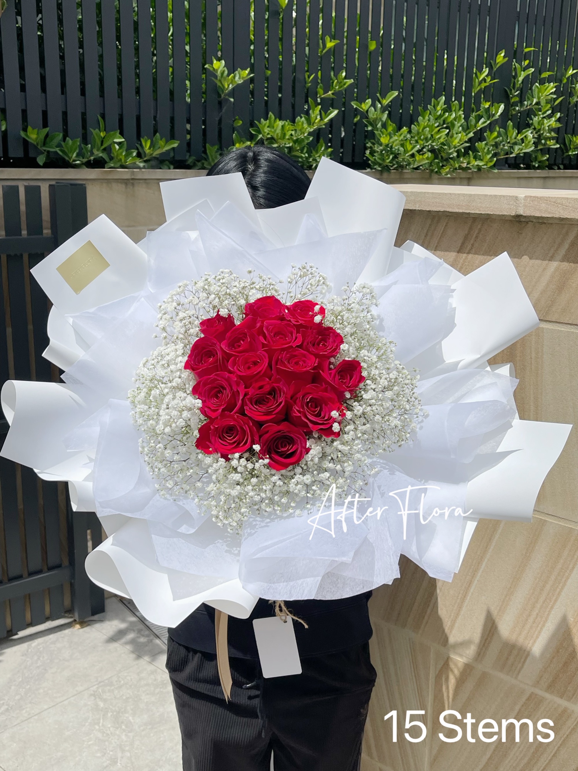 Red roses with white baby's breath