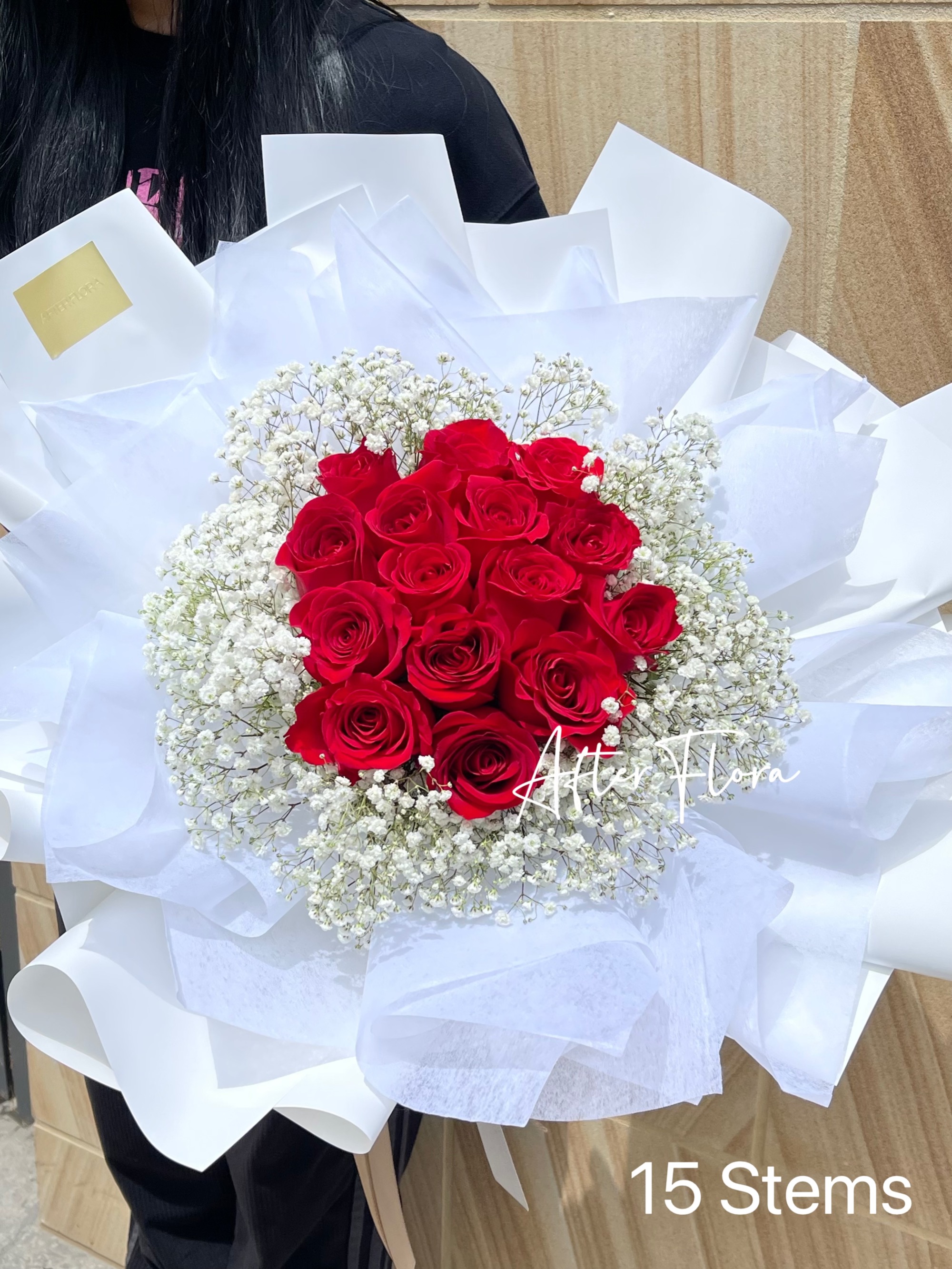 Red roses with white baby's breath