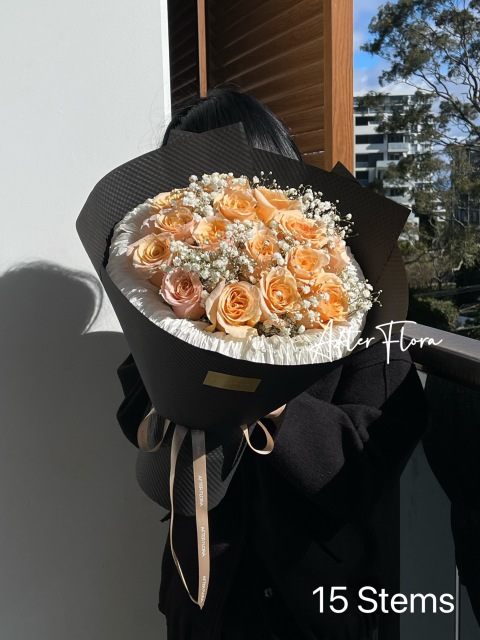 Peach Roses + baby's breath