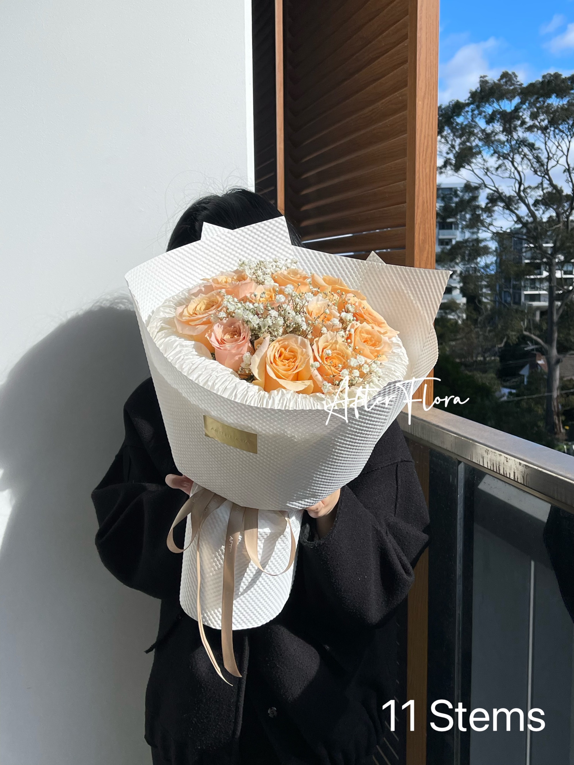 Peach Roses + baby's breath