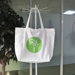 Cotton twill fabric with buttoned shopping bag