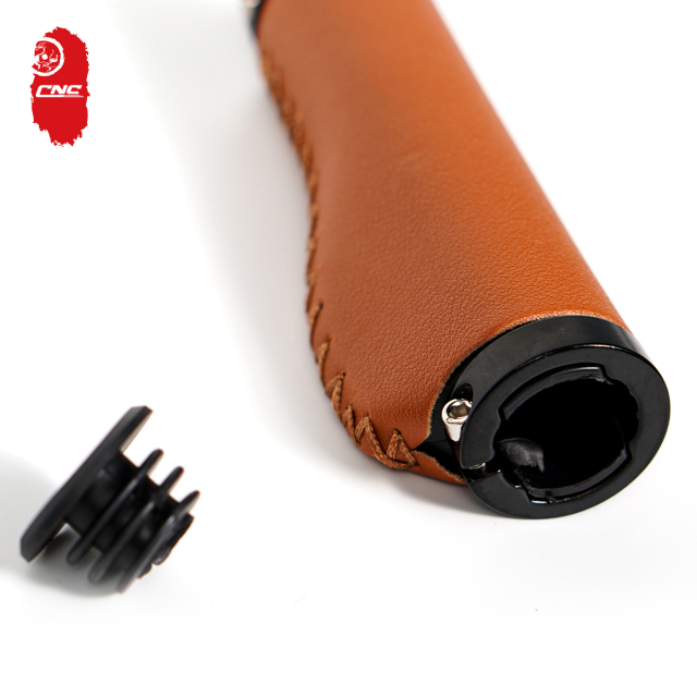 Ergonomics Bike Accessories Anti-slip with Dustproof Plugs Length 130mm Leather Bicycle Grip