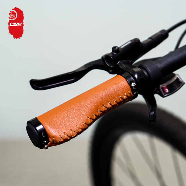 Ergonomics Bike Accessories Anti-slip with Dustproof Plugs Length 130mm Leather Bicycle Grip