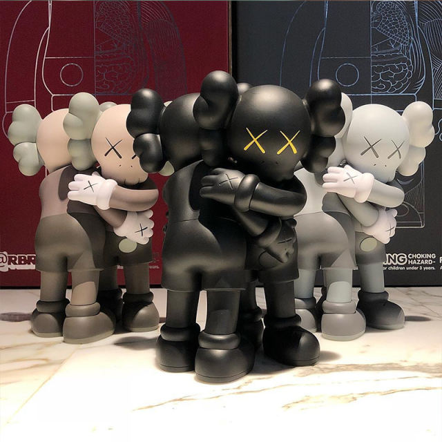 MAND KAWS together figures black grey brown