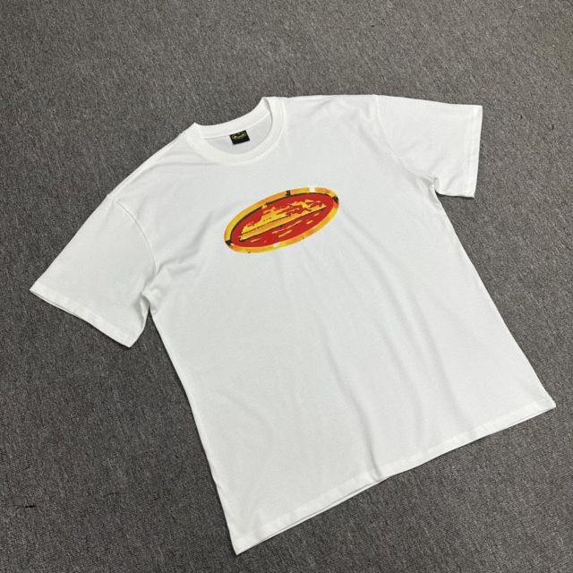 Corteiz gold and red badge tee white black