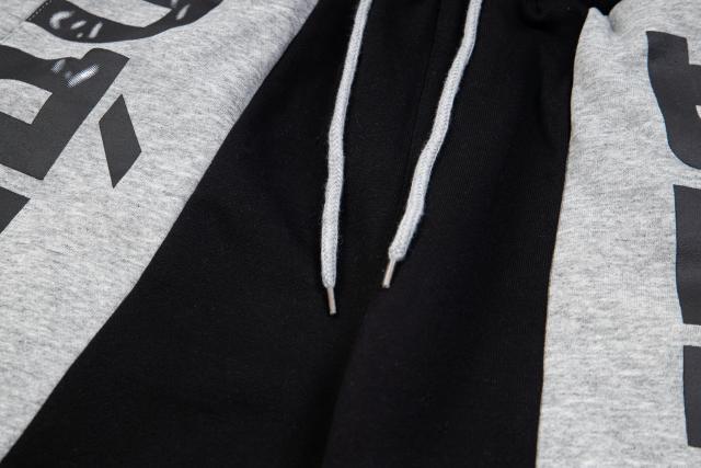 Black and gray spliced logo drawstring shorts